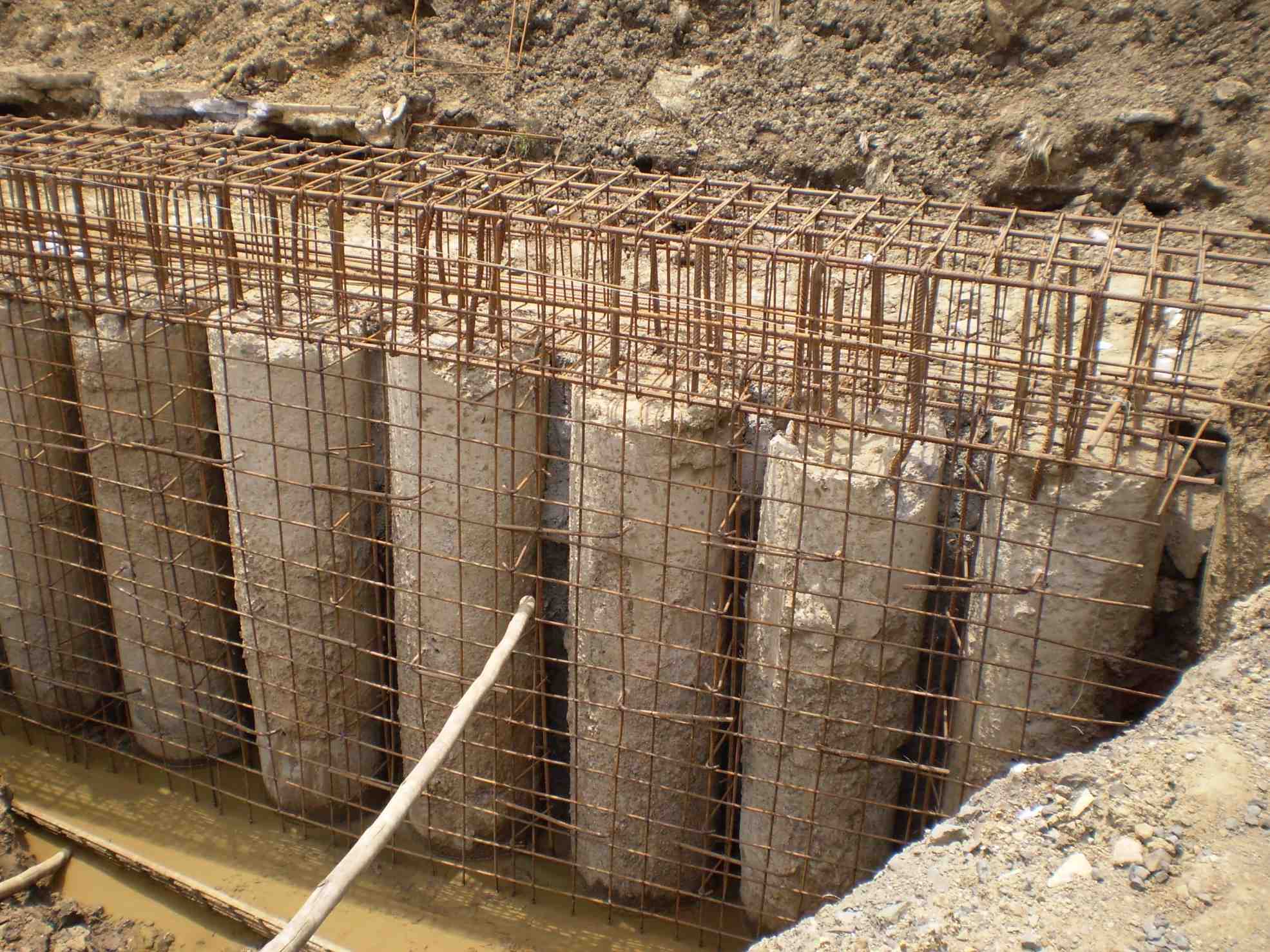 Shoring piles for basement retaining walls